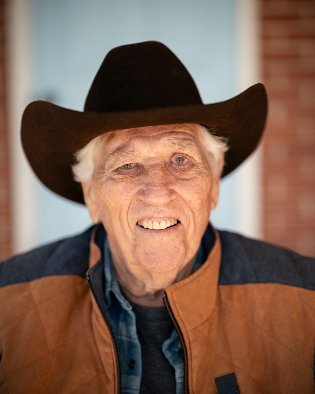 Junior Robertson on the porch, in his hat